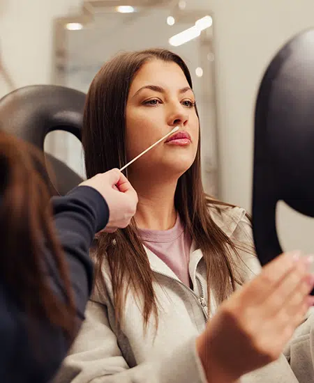 woman receiving consultation at bcrn aesthetics
